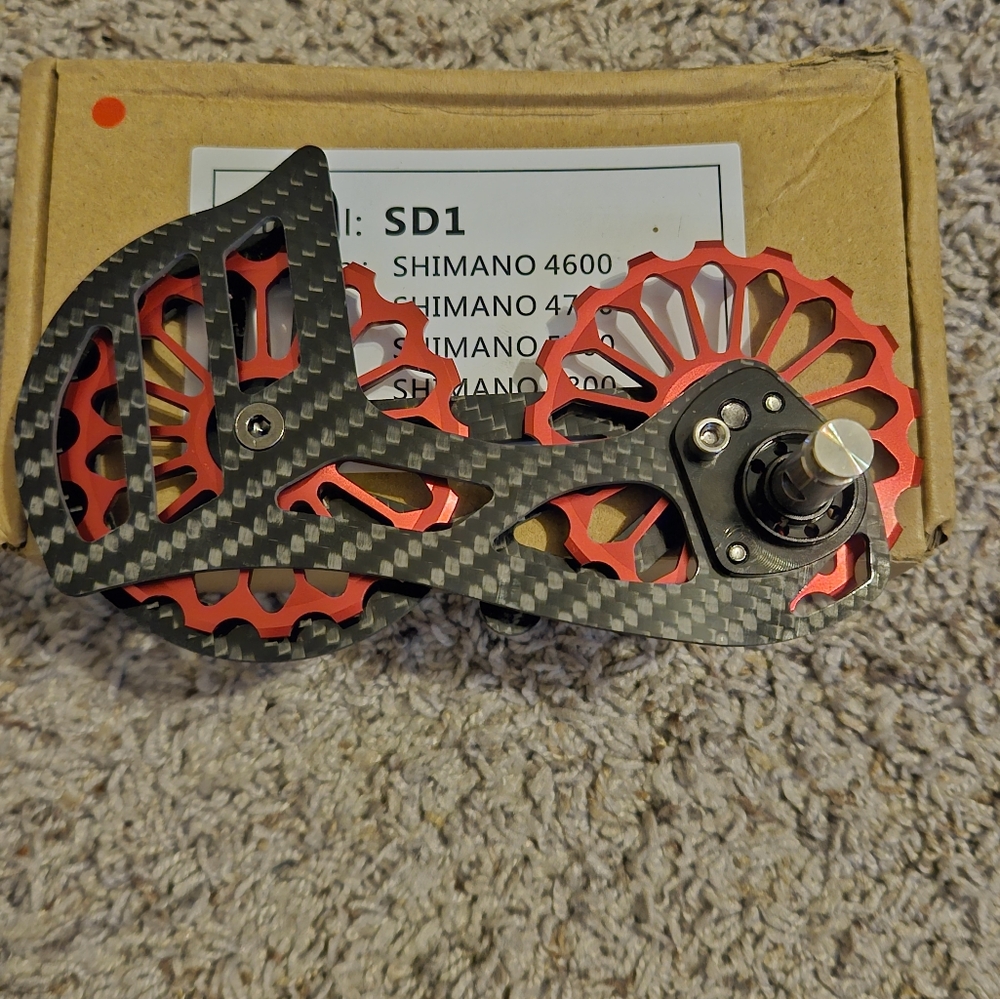 Ceramic bearing carbon frame for rear deraileur